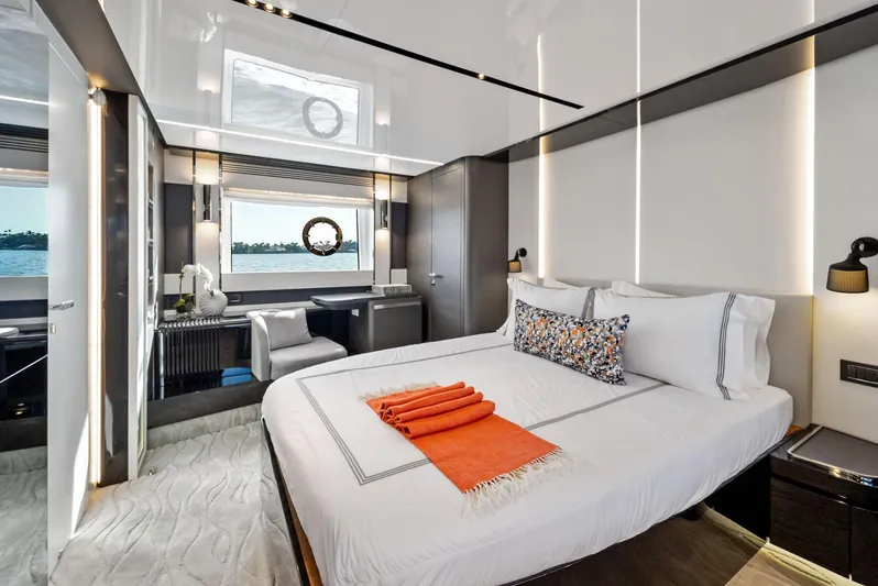 Ocean's Se7en Yacht Photos Pics Luxurious bedroom interior of 2022 Azimut S8 yacht with modern decor and ocean view.
