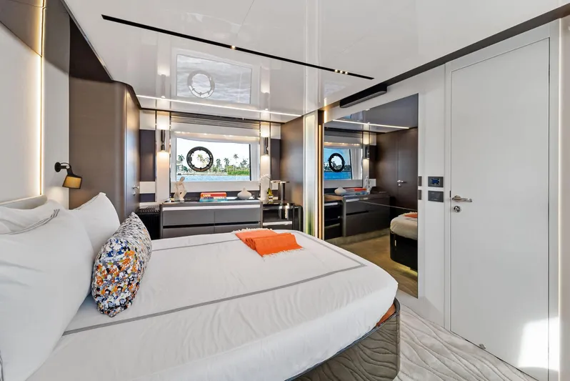 Ocean's Se7en Yacht Photos Pics Luxurious interior of 2022 Azimut S8 yacht, featuring a modern bedroom with ocean view.