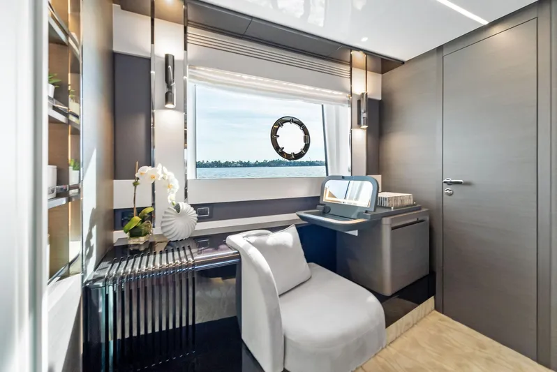 Ocean's Se7en Yacht Photos Pics Luxurious interior of 2022 Azimut S8 yacht with elegant furnishings and scenic window view.