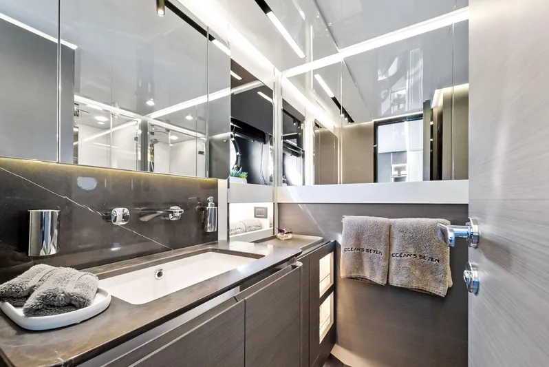 Ocean's Se7en Yacht Photos Pics Luxurious bathroom interior of 2022 Azimut S8 yacht, featuring modern fixtures and elegant design.
