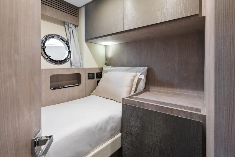 Ocean's Se7en Yacht Photos Pics 2022 Azimut S8 yacht interior cabin with modern design and cozy bed.