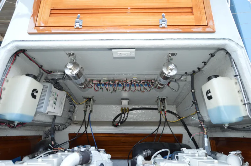  Yacht Photos Pics Engine compartment of 2023 Strike 29 boat, showcasing wiring and components.