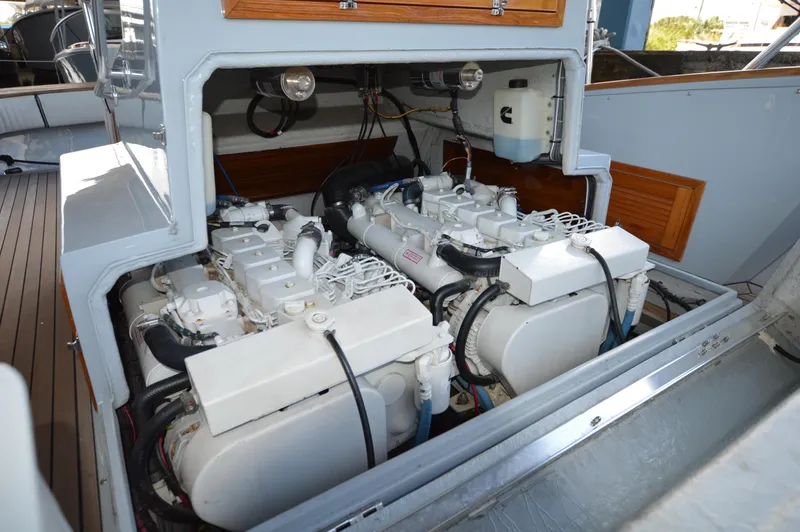  Yacht Photos Pics Engine compartment of 2023 Strike 29 boat, showcasing dual engines and detailed components.