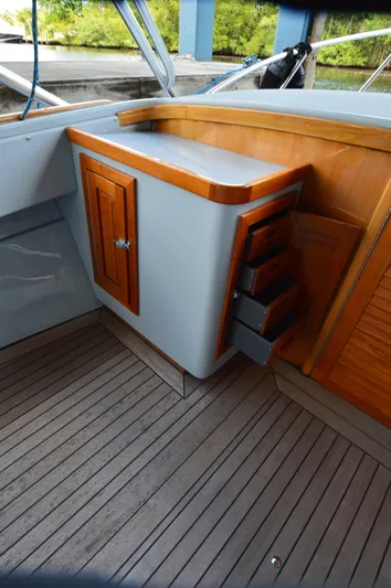 Yacht Photos Pics 2023 Strike 29 boat interior with wooden cabinetry and sleek design.