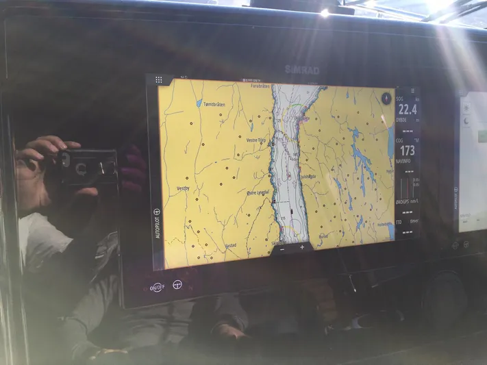  Yacht Photos Pics Navigation display on 2018 Ferretti Yachts 670, showing a detailed marine map.