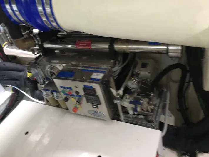  Yacht Photos Pics Engine room of 2018 Ferretti Yachts 670, showcasing mechanical components and systems.