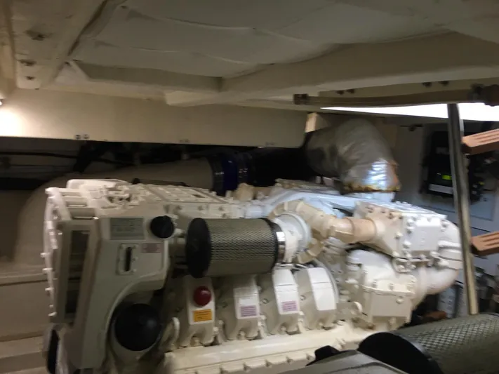  Yacht Photos Pics Engine room of a 2018 Ferretti Yachts 670, showcasing its powerful machinery.