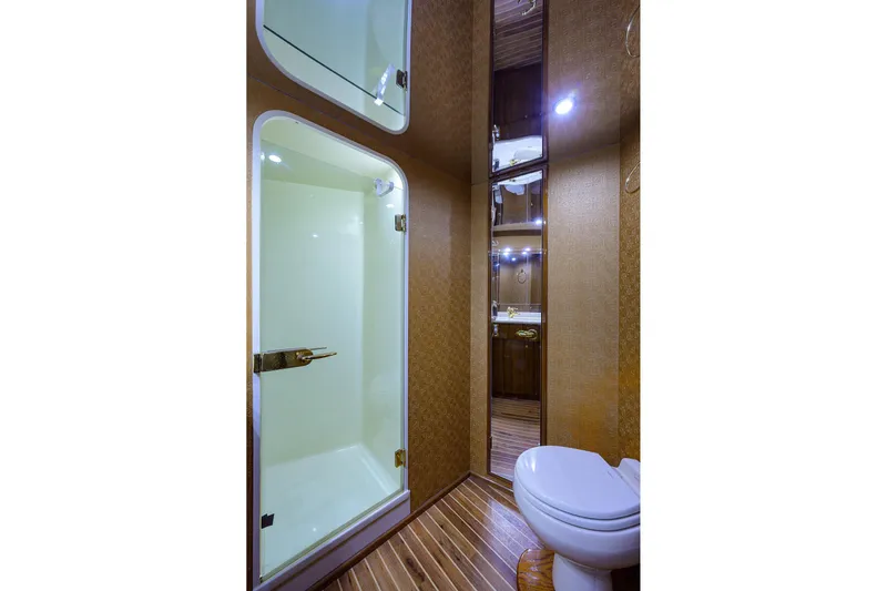  Yacht Photos Pics Luxurious bathroom in 2005 Viking 61 yacht with shower and toilet.