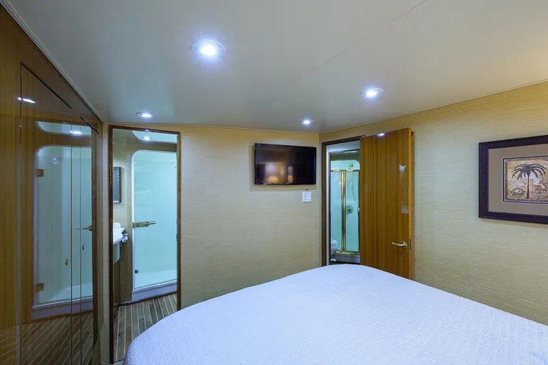  Yacht Photos Pics Luxurious cabin interior of a 2005 Viking 61 yacht with modern amenities.