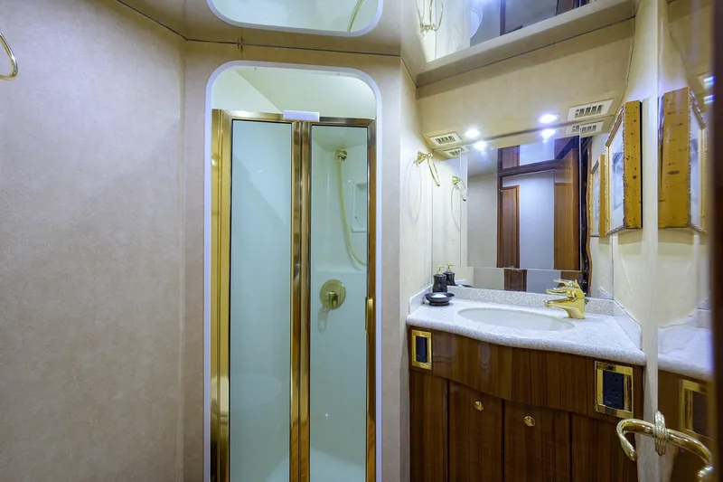  Yacht Photos Pics Luxurious bathroom in 2005 Viking 61 yacht with shower and elegant vanity.