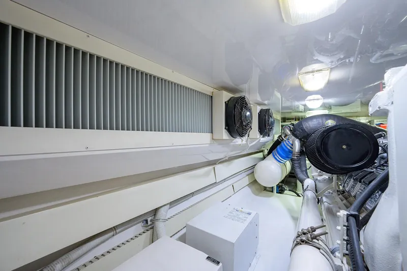  Yacht Photos Pics Engine room of a 2005 Viking 61 yacht, featuring ventilation and machinery components.