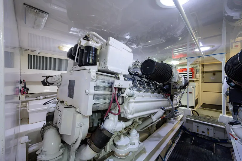  Yacht Photos Pics Engine room of a 2005 Viking 61 yacht, showcasing a powerful marine engine.