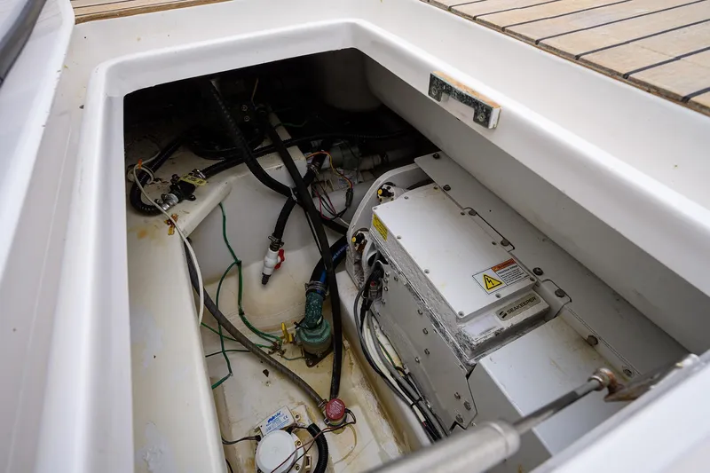  Yacht Photos Pics Engine compartment of a 2005 Viking 61 yacht, showing mechanical components and wiring.