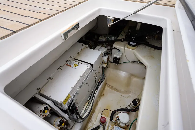  Yacht Photos Pics Engine compartment of a 2005 Viking 61 yacht, showcasing mechanical components and wiring.