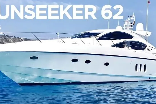 Bes Yacht Photos Pics 2007 Sunseeker Predator 62 yacht on calm blue water, showcasing sleek design.