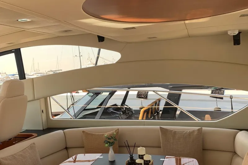 Bes Yacht Photos Pics Luxurious interior of 2007 Sunseeker Predator 62 yacht with elegant seating and decor.