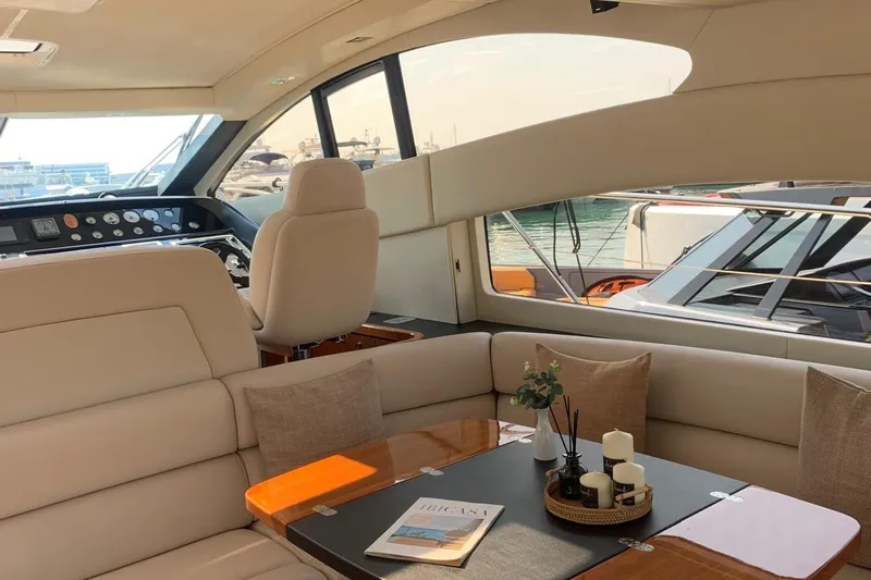 Bes Yacht Photos Pics Luxurious interior of a 2007 Sunseeker Predator 62 yacht with elegant seating and decor.