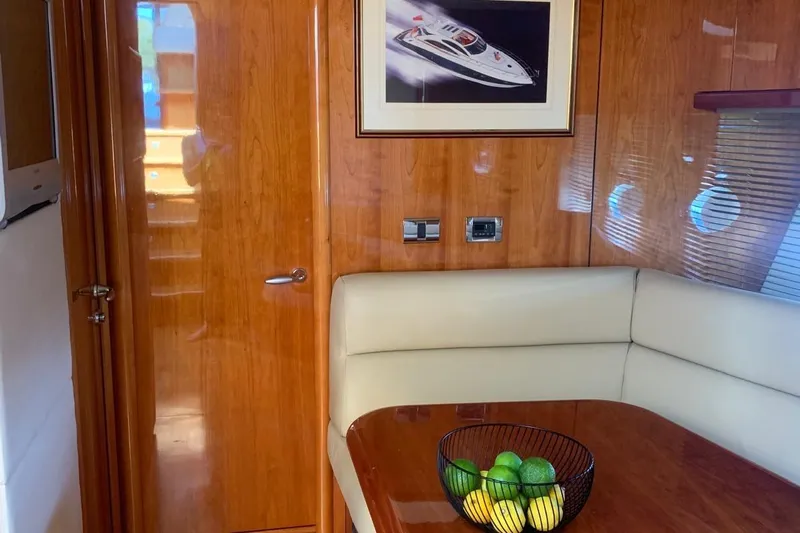 Bes Yacht Photos Pics Luxurious Sunseeker Predator 62 yacht interior with wood paneling and fruit bowl, 2007 model.