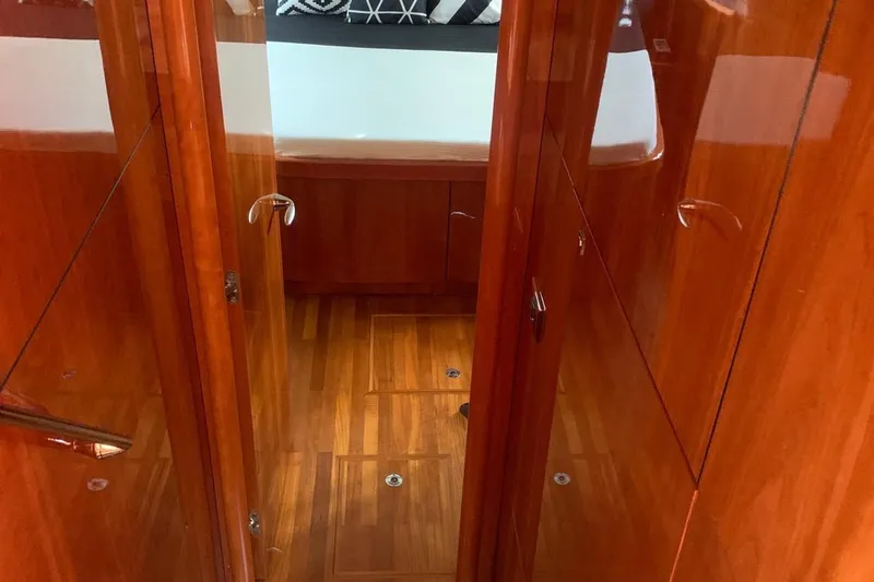 Bes Yacht Photos Pics Interior of 2007 Sunseeker Predator 62 yacht with polished wood finish and modern design.