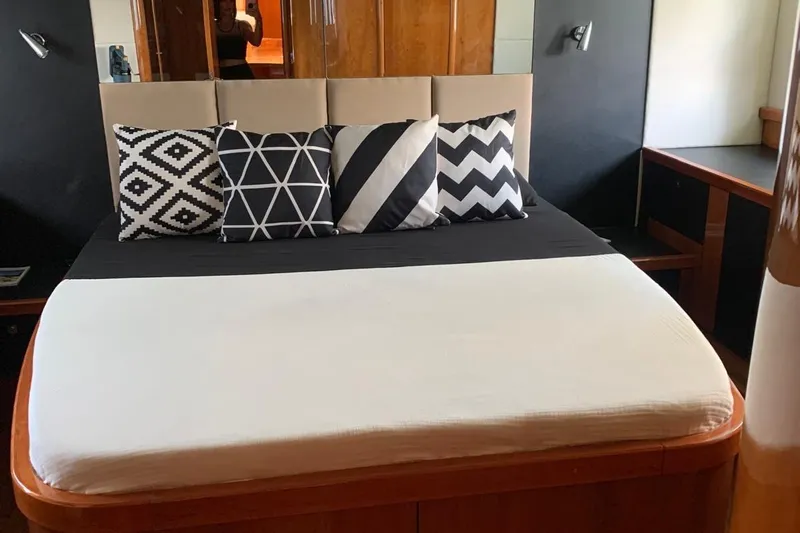 Bes Yacht Photos Pics Luxurious bedroom interior of 2007 Sunseeker Predator 62 yacht with stylish geometric pillows.