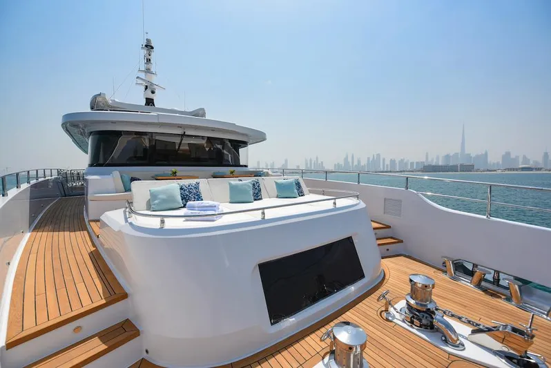  Yacht Photos Pics Luxurious 2026 Majesty 120 yacht with elegant deck and city skyline view.