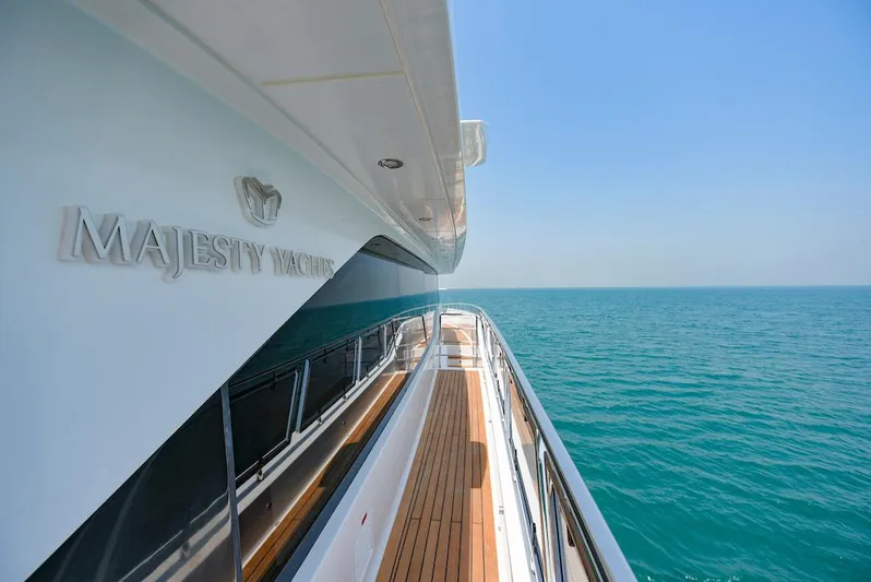  Yacht Photos Pics Majesty 120 yacht, 2026 model, cruising on clear blue ocean waters.