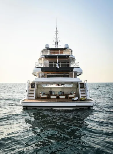  Yacht Photos Pics Luxury Majesty 120 yacht, 2026 model, cruising on open sea at sunset.