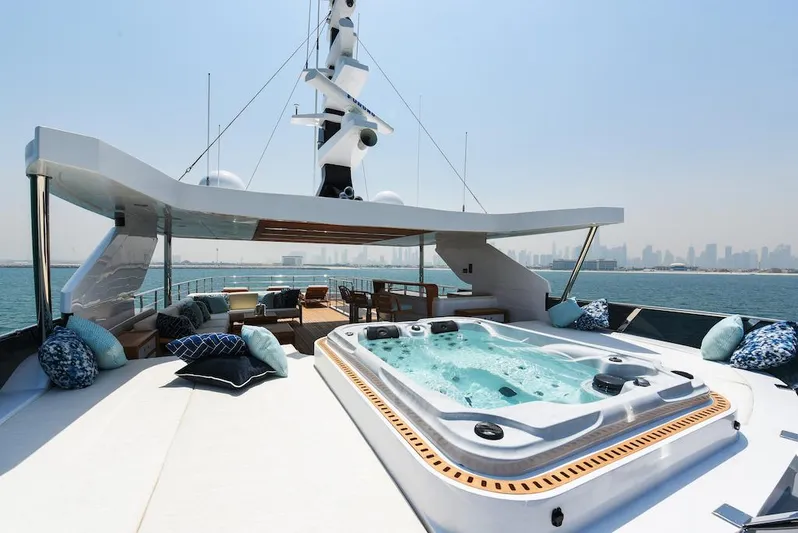  Yacht Photos Pics Luxurious 2026 Majesty 120 yacht with jacuzzi on deck, ocean view.