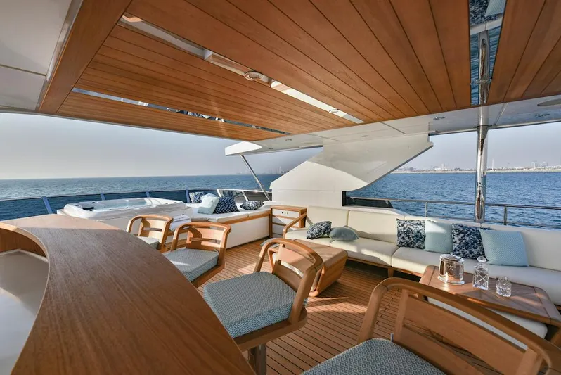 Yacht Photos Pics Luxurious 2026 Majesty 120 yacht interior with elegant seating and ocean view.