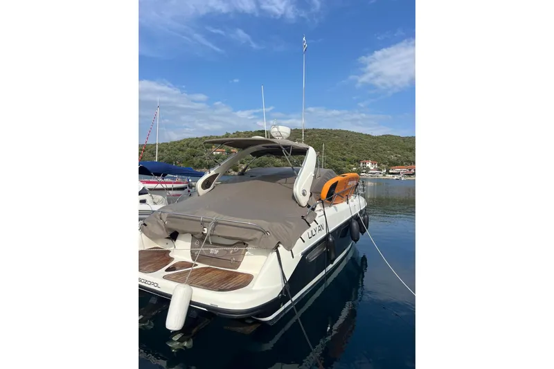  Yacht Photos Pics 2009 Crachi Endurance 33 boat docked in scenic marina with clear skies.