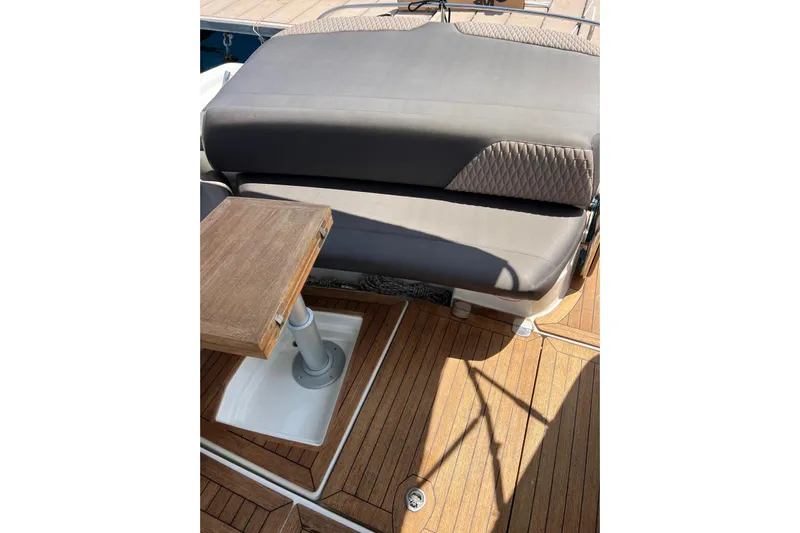  Yacht Photos Pics Luxurious seating area on 2009 Crachi Endurance 33 yacht with wooden table.