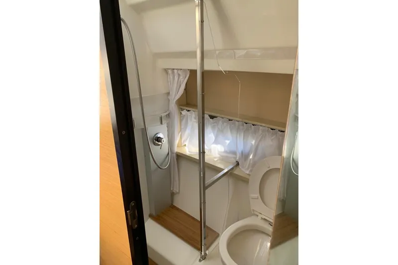  Yacht Photos Pics Compact bathroom in 2009 Crachi Endurance 33 boat with shower and toilet.