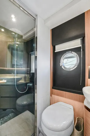  Yacht Photos Pics Luxurious bathroom in 2019 Absolute 50 Fly yacht with modern shower and porthole window.
