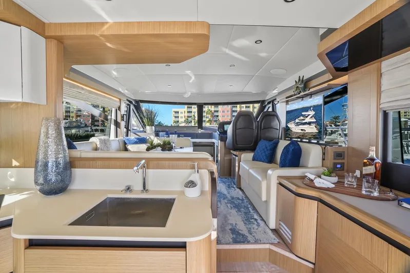  Yacht Photos Pics Luxurious interior of a 2019 Absolute 50 Fly yacht with modern furnishings and elegant design.