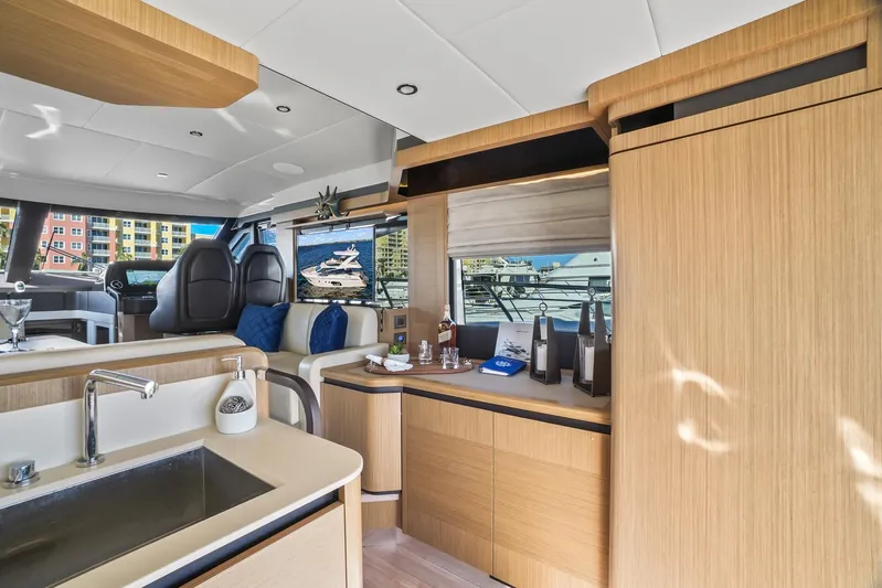  Yacht Photos Pics Luxurious interior of a 2019 Absolute 50 Fly yacht with modern furnishings and sleek design.