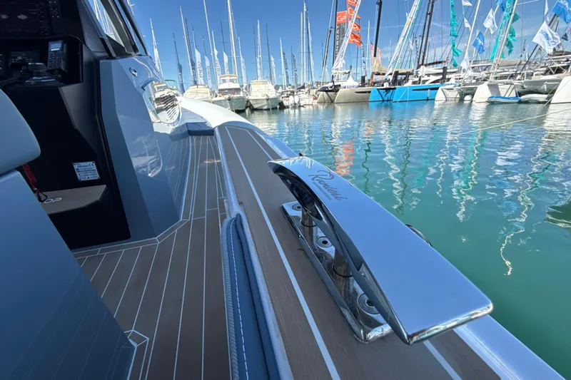  Yacht Photos Pics 2026 Ranieri CAYMAN 50.0 HARD TOP yacht docked, showcasing sleek deck design and marina view.