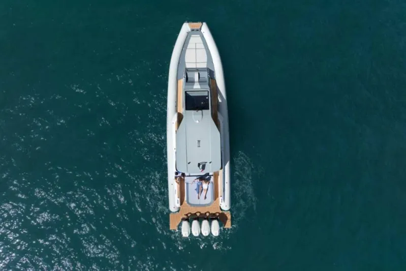  Yacht Photos Pics Aerial view of 2026 Ranieri CAYMAN 50.0 HARD TOP yacht on blue water.