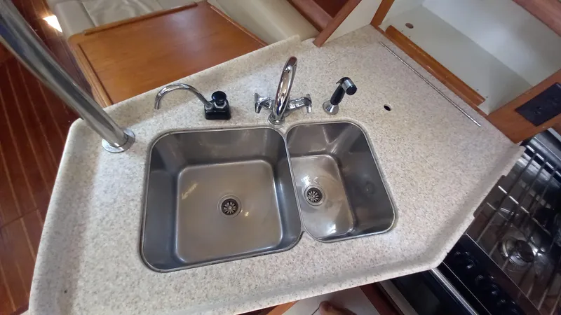 Sunny Girl Yacht Photos Pics Dual sink setup in 2004 Island Packet 370 yacht kitchen.