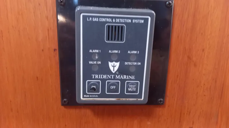 Sunny Girl Yacht Photos Pics LP gas control panel on 2004 Island Packet 370 yacht, featuring Trident Marine system.