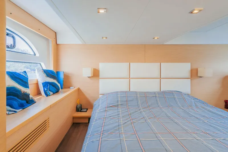  Yacht Photos Pics Luxurious bedroom interior of 2011 Beneteau Monte Carlo 47 Fly yacht.