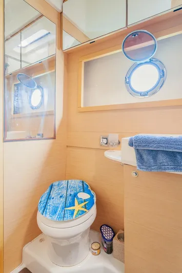  Yacht Photos Pics Bathroom interior of 2011 Beneteau Monte Carlo 47 Fly yacht with nautical decor.