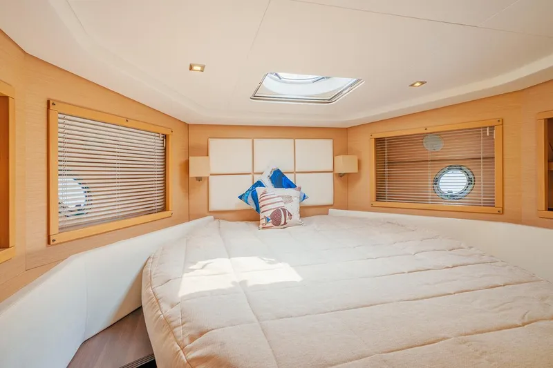  Yacht Photos Pics Luxurious bedroom interior of 2011 Beneteau Monte Carlo 47 Fly yacht.