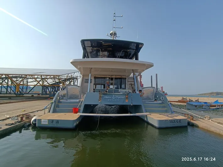  Yacht Photos Pics 2025 Mazarin 55 Catamaran Hybrid Electric EVO II docked at marina.