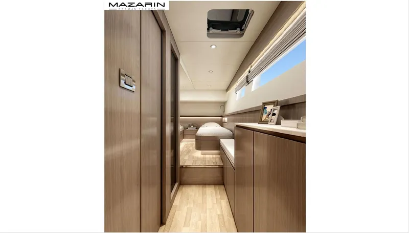  Yacht Photos Pics Luxurious interior of 2025 Mazarin 55 Catamaran Hybrid Electric EVO II, featuring modern wood finishes.