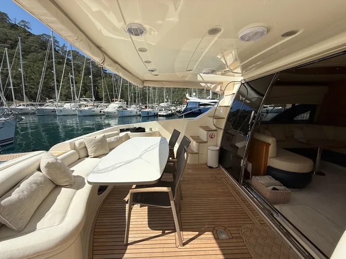 Nvn Yacht Photos Pics Luxurious 2007 Azimut 62 yacht interior with elegant seating and dining area.