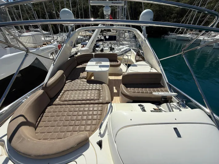 Nvn Yacht Photos Pics Luxurious 2007 Azimut 62 yacht deck with plush seating and elegant design.