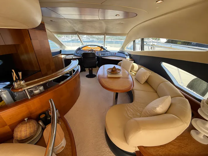Nvn Yacht Photos Pics Luxurious interior of a 2007 Azimut 62 yacht with elegant seating and modern helm.
