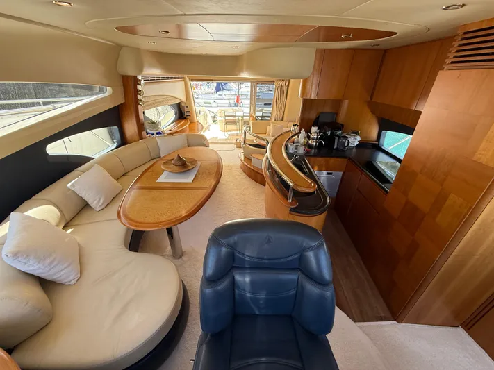 Nvn Yacht Photos Pics Luxurious interior of a 2007 Azimut 62 yacht with elegant seating and modern kitchen.