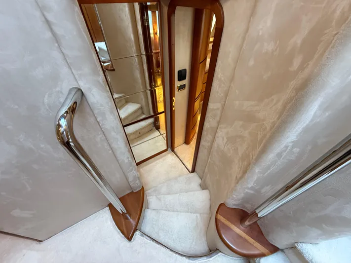 Nvn Yacht Photos Pics Luxurious interior staircase of a 2007 Azimut 62 yacht with elegant design features.