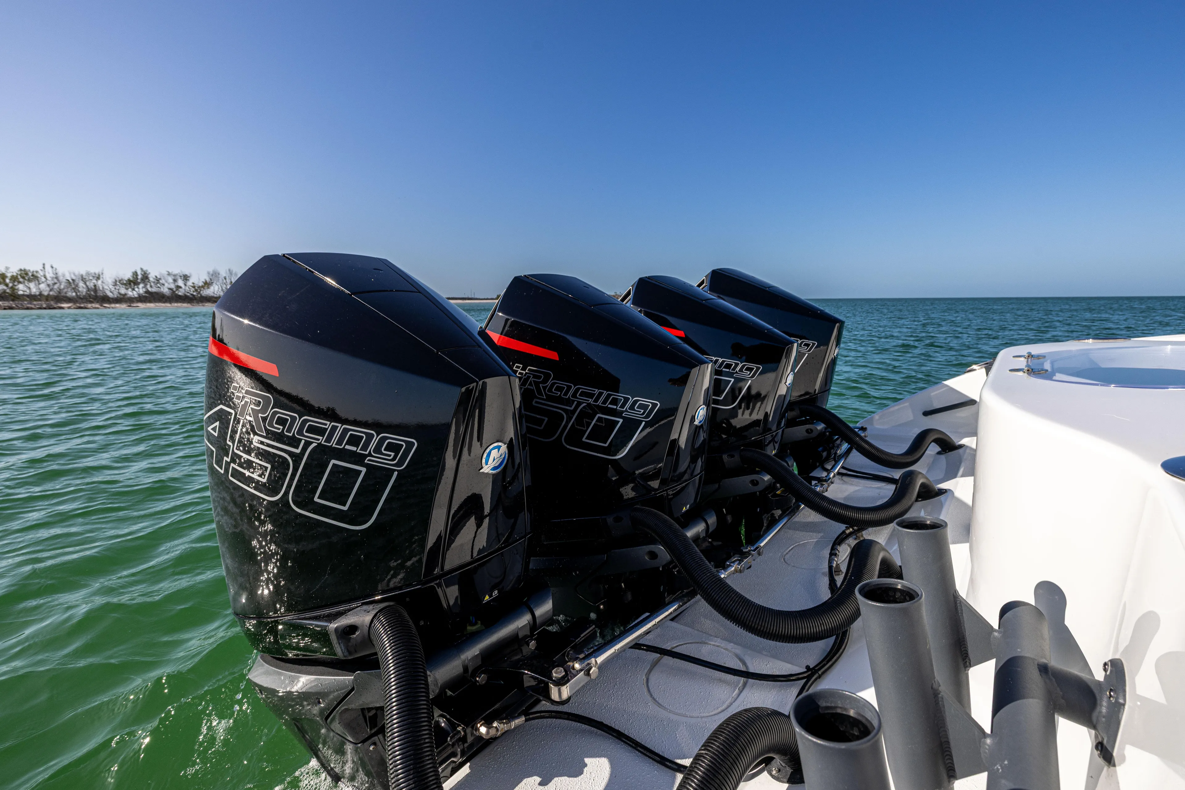  Yacht Photos Pics 2023 Yellowfin 39 Offshore boat with four powerful Racing 450 engines on open water.